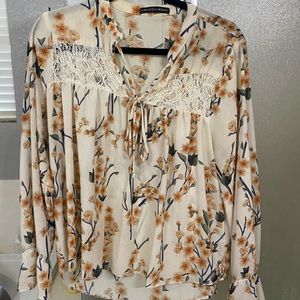 Adorable, floral, sheer, boho style blouse.